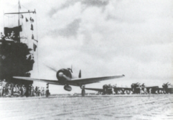 This rare photograph from the flight deck of a Japanese aircraft carrier shows an A6M3 Zero Model 32 taking off on a strike mission in the South Pacific in 1943.